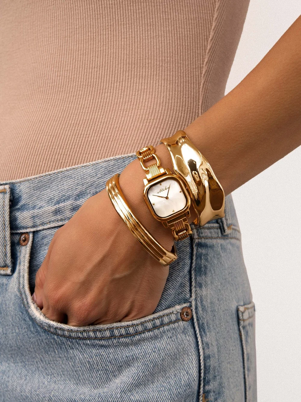 ettika elegant gold